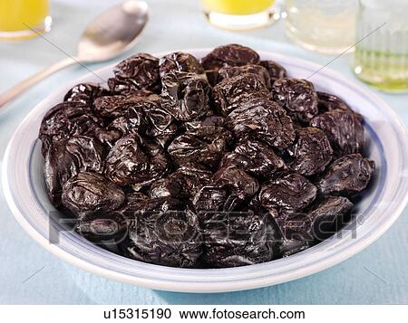 Prunes in Blue Bowl - Non Exclusive View Large Photo Image Stock Image - Prunes in Blue Bowl - Non Exclusive. Fotosearch