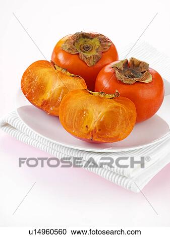 Stock Image - Sharon Fruit / Persimmon Fruit. Fotosearch