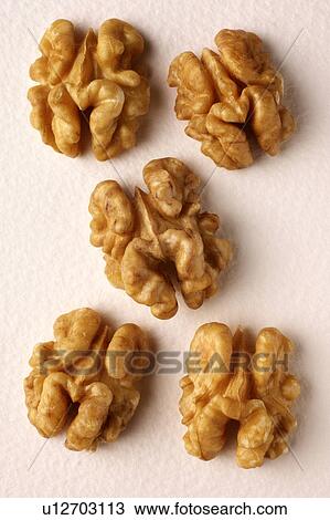 Stock Image - Shelled walnuts. Fotosearch