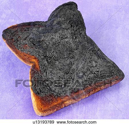 Stock Photo - Single Burnt Toast - Non Exclusive. Fotosearch