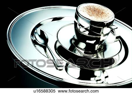 Stock Photography - Single cappuccino on chrome. Fotosearch