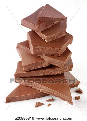 Stock Photograph - Stack of Milk Chocolate Chunks - Non Exclusive. Fotosearch