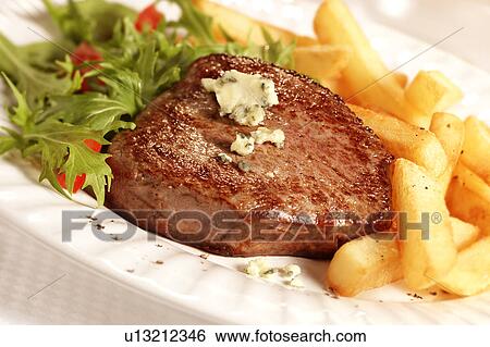 Stock Photograph - Steak And Chips With Stilton - Non Exclusive. Fotosearch