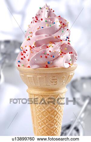Stock Image - Strawberry Ice Cream Cone With Sprinkles - Non Exclusive. Fotosearch