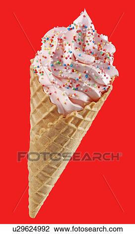 Stock Image - Strawberry Ice Cream Cone With Sprinkles on Red - Non Exclusive. Fotosearch
