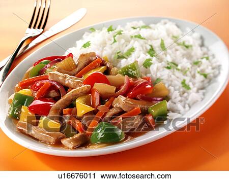 Stock Image - Sweet and Sour Pork With Rice - Non Exclusive. Fotosearch