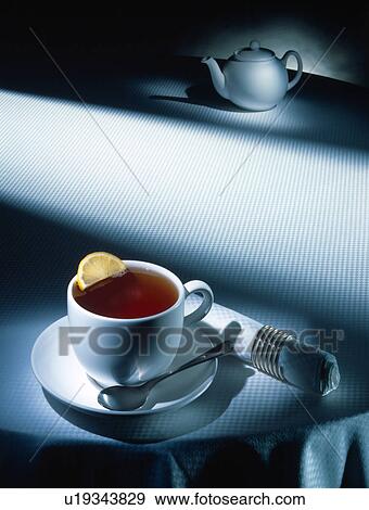 Stock Photo - Tea cup and pot. Fotosearch