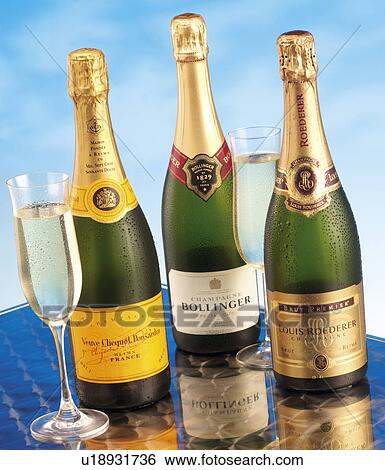 Stock Photograph - Three Champagne Bottles - Non Exclusive. Fotosearch