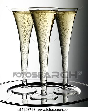 Stock Image - Three Glasses of Champagne - Non Exclusive. Fotosearch