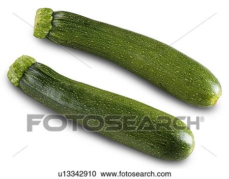 Stock Image - Two courgettes, zucchini, on white. Fotosearch