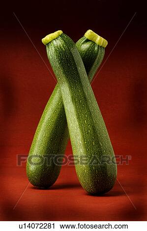Stock Image - Two courgettes, zucchini. Fotosearch
