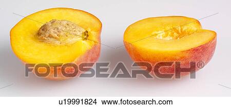 Picture - Two Peach Halves - Non Exclusive. Fotosearch