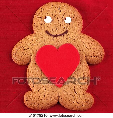 Stock Image - Valentines gingerbread man biscuit. Fotosearch