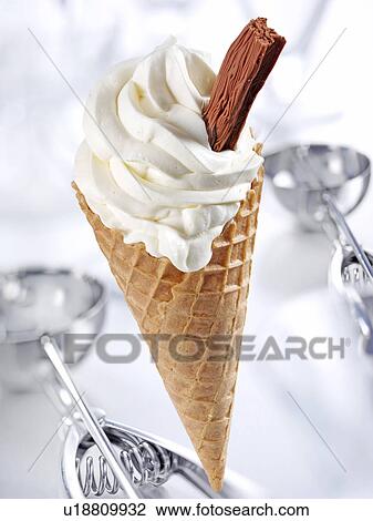 Stock Image - Vanilla Ice Cream Cone With Chocolate Flake - Non Exclusive. Fotosearch