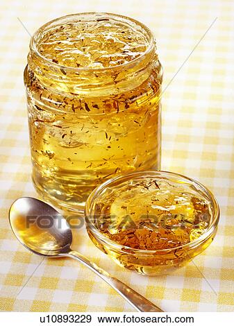 Stock Photo - Apple And Thyme Jelly Without Label- Non Exclusive. Fotosearch