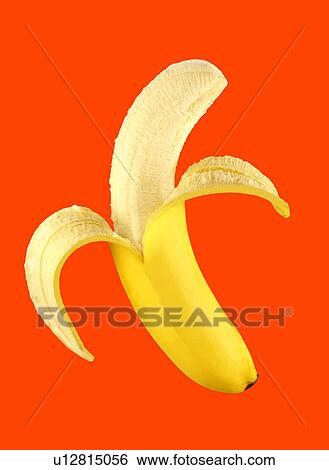Stock Photograph - Banana on orange. Fotosearch
