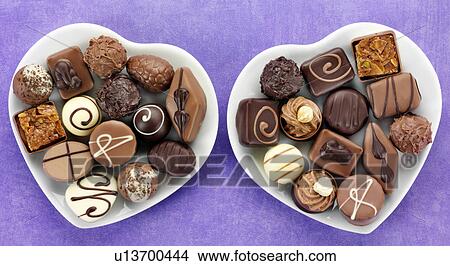Belgian Chocolate in Heart Shaped Dish - Non Exclusive View Large Photo Image Picture - Belgian Chocolate in Heart Shaped Dish - Non Exclusive. Fotosearch