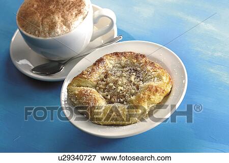 Stock Photo - Cappucino and danish pastry. Fotosearch
