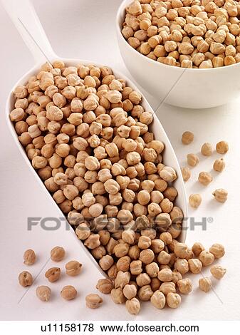 Stock Photo - Chickpeas in Scoop - Non Exclusive. Fotosearch