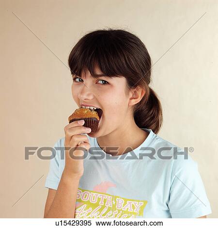 Stock Photography - Child eating. Fotosearch