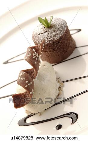 Stock Photo - Chocolate sponge with ice cream. Fotosearch