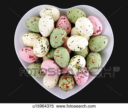 Stock Photography - Easter Eggs in Heart Dish - Non Exclusive. Fotosearch