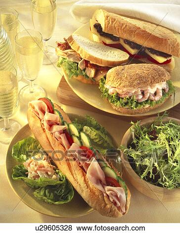 Filled sandwich, baguette and baps View Large Photo Image Stock Photo - Filled sandwich, baguette and baps. Fotosearch