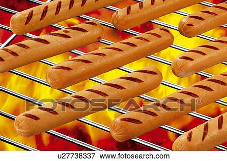 Stock Photo - Hot dogs barbecue. Fotosearch