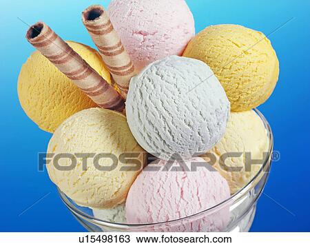 Stock Image - Ice Cream Scoop in Glass Bowl With Wafer - Non Exclusive. Fotosearch