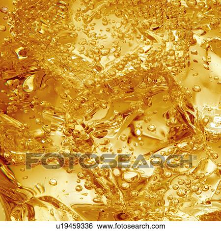 Ice in fizzy liquid / drink View Large Photo Image Stock Photograph - Ice in fizzy liquid / drink. Fotosearch
