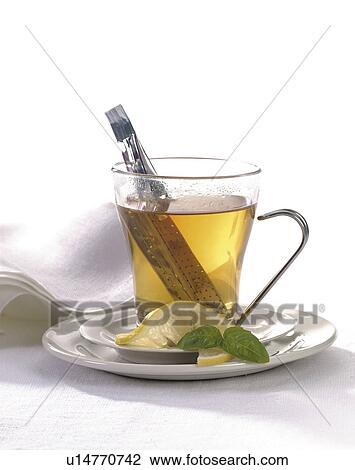 Stock Image - Infuser, lemon tea. Fotosearch