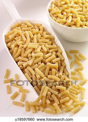 Stock Image - Macaroni in Scoop - Non Exclusive. Fotosearch