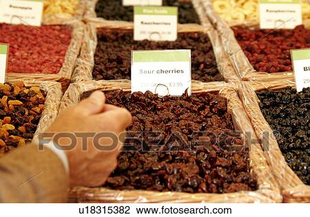 Market stall with dried fruits View Large Photo Image Stock Image - Market stall with dried fruits. Fotosearch
