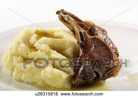 Stock Photo - Mashed potato and lamb chops. Fotosearch