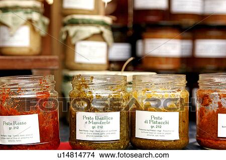 Open jars of pesto for tasting View Large Photo Image Picture - Open jars of pesto for tasting. Fotosearch