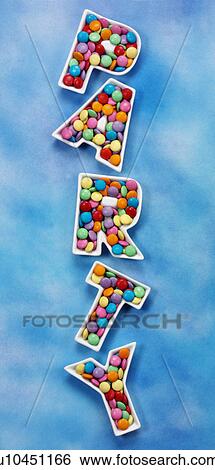 Party chocolate candies on Blue - Non Exclusive View Large Photo Image Stock Photograph - Party chocolate candies on Blue - Non Exclusive. Fotosearch