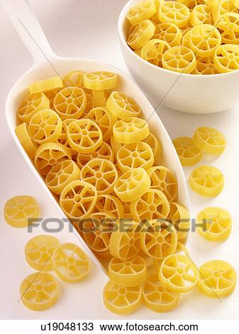 Stock Image - Rotelline Pasta in Scoop - Non Exclusive. Fotosearch