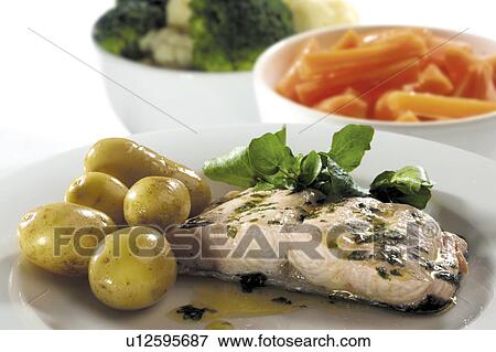 Stock Photo - Salmon with new potatoes. Fotosearch