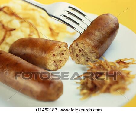 Stock Image - Sausge and Mash with onion. Fotosearch