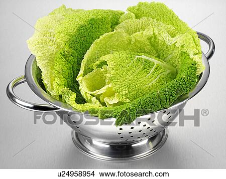 Picture - Savoy Cabbage Leaves In Colander. Fotosearch