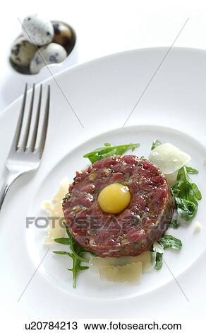 Steak tartare with quails eggs View Large Photo Image Stock Image - Steak tartare with quails eggs. Fotosearch
