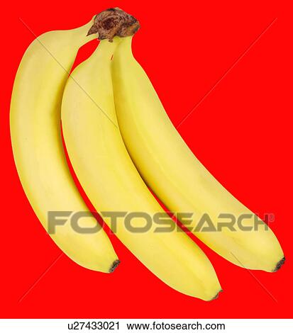 Stock Image - Three Bananas on Red - Non Exclusive. Fotosearch