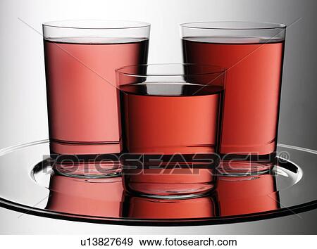 Stock Photo - Three Glasses of Cranberry Juice - Non Exclusive. Fotosearch
