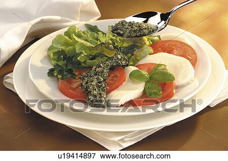 Tomato and mozzarella salad View Large Photo Image Stock Photo - Tomato and mozzarella salad. Fotosearch