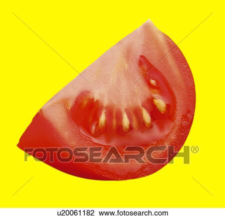 Stock Image - Tomato slice on yellow. Fotosearch