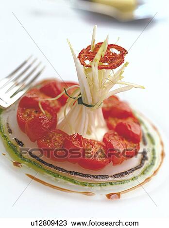Stock Image - Tomato starter. Fotosearch