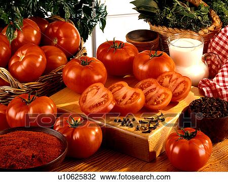 Stock Image - Tomatoes and spices. Fotosearch
