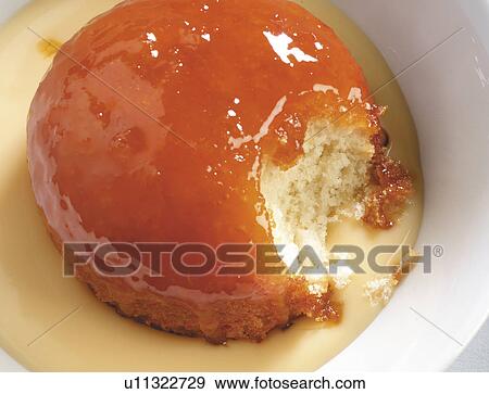 Treacle pudding and custard View Large Photo Image Stock Photo - Treacle pudding and custard. Fotosearch