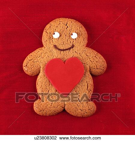Valentines gingerbread man biscuit View Large Photo Image Stock Image - Valentines gingerbread man biscuit. Fotosearch