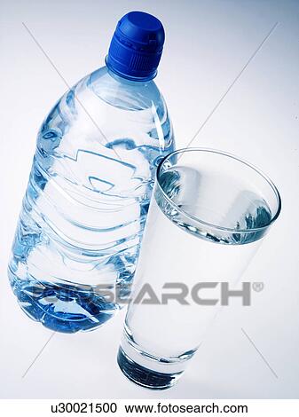 Stock Image - Water Bottle And Glass - Non Exclusive. Fotosearch